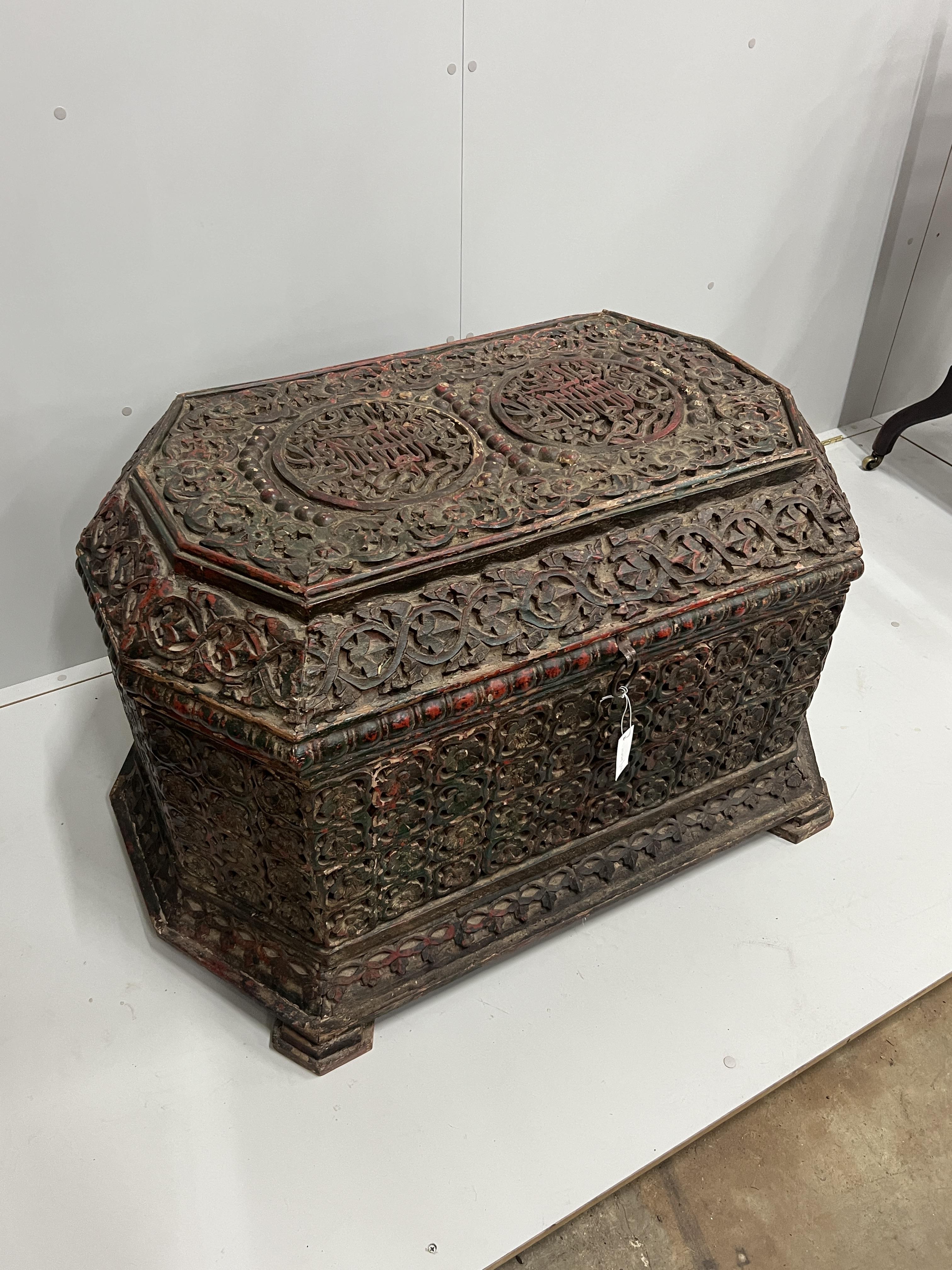 An Islamic octagonal carved wood trunk, width 116cm, depth 64cm, height 64cm, the cover carved “Abu Al-Nasr Qaitbay” (Glory Be to Our Master the Sultan)